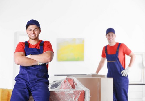Moving van and removal team preparing a home move in Brixton