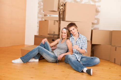 Local removals team helping a Brixton home move with packed boxes
