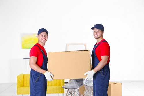 Professional movers planning a commercial relocation route in Brixton