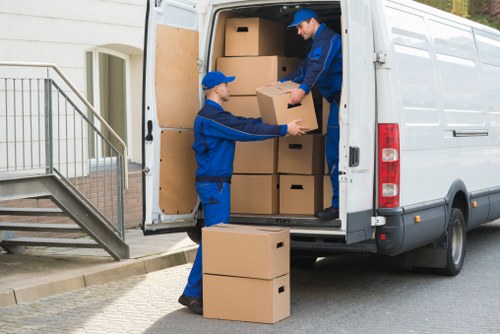 Local van transport handling furniture collection near Brixton streets