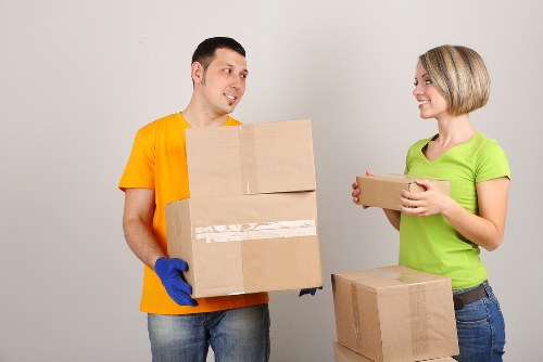 Furniture and boxes being loaded into a removals van in South London