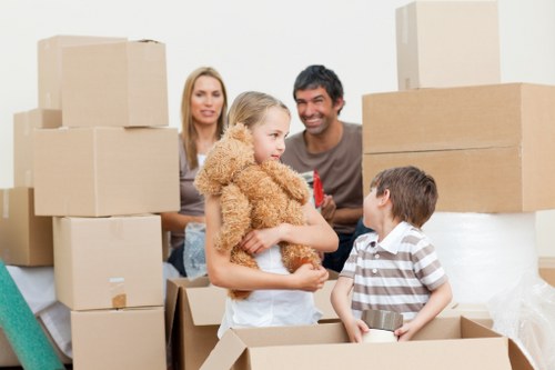 Professional man and van service loading furniture in Brixton